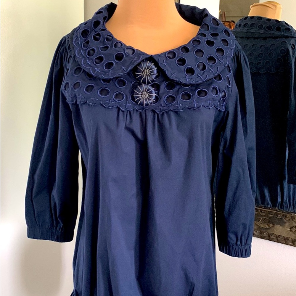SAYA BLOUSE UNIQUE. EYELET COLLAR AND BACK SHOULDER AREA.SIZE MED